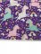 Détail des motifs de licornes et d arcs-en-ciel de la nappe en plastique licorne party