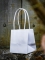 6 petits sacs en carton blancs 9 x 10 cm avec anses torsadées