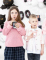 Enfants utilisant les gobelets en carton Halloween