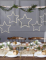 Mise en situation sur une table de fête des serviettes en papier sapin Merry Christmas