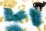 Mise en scène des 20 plumes de décoration chic et légères turquoise
