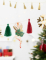 Détail de la ballerine et des pompons de la guirlande en papier casse noisette et ballerine pour noël