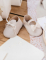 Détail des nœuds des contenants en forme de ballerine bébé