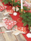 Mise en scène festive sur table des serviettes en papier champignon rouge et blanc