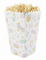 Vue de la boîte remplie de popcorn de la boîte à pop corn pyjama party irisé aux motifs girly