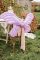 Mise en situation sur une chaise du ballon aluminium ailes de fée lilas